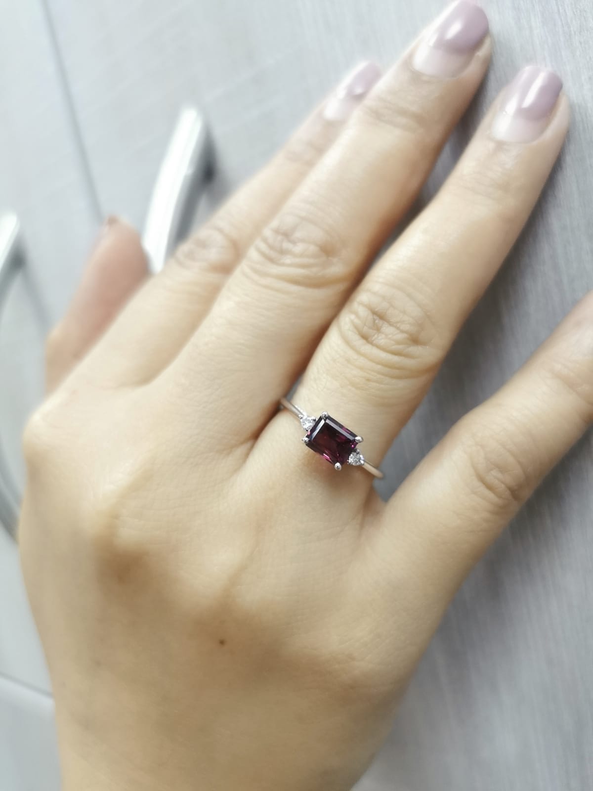 1.60ct Rhodolite ring with round brilliant diamonds