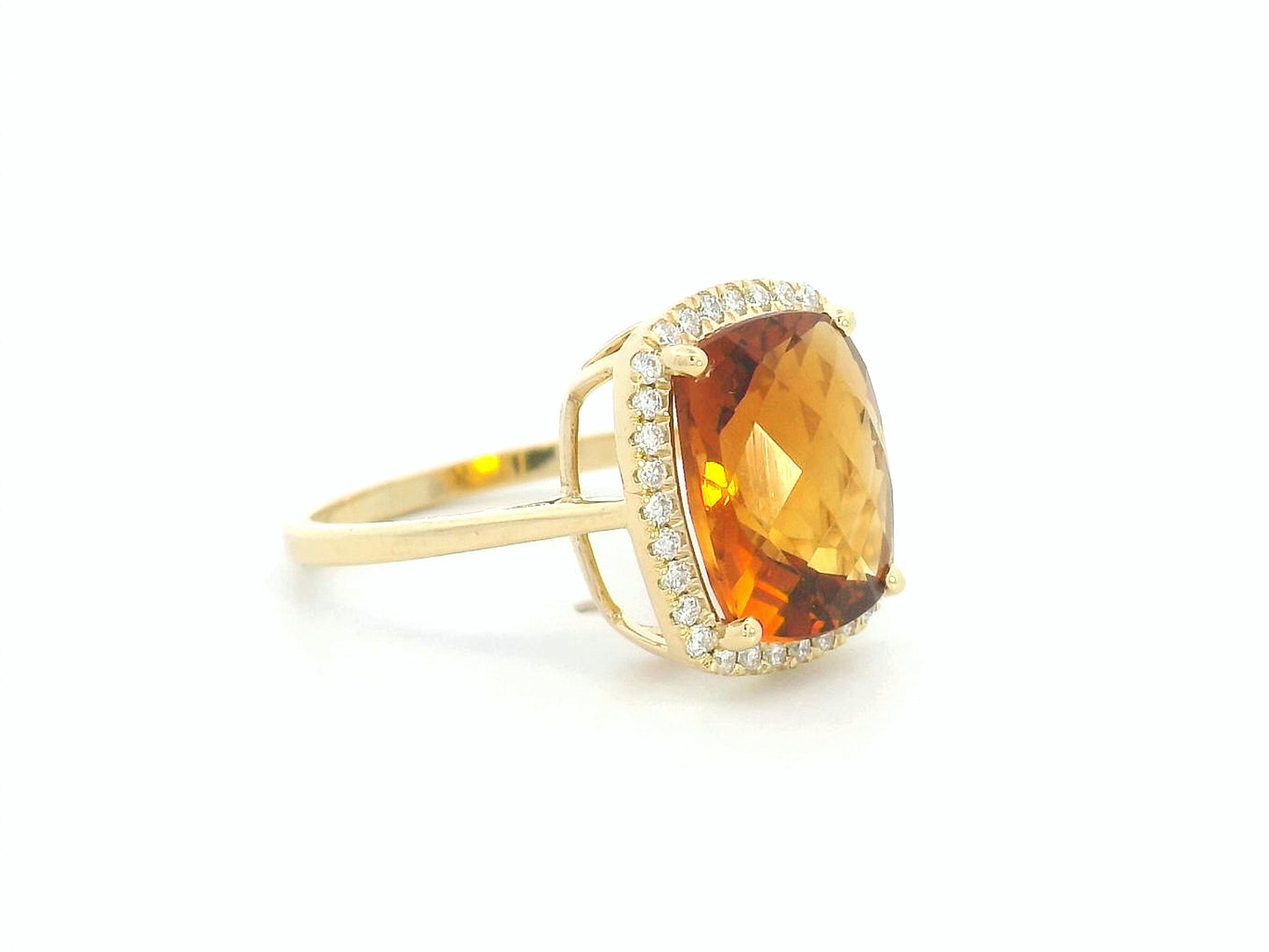 4.38ct citrine ring set in gold with sparkling diamonds