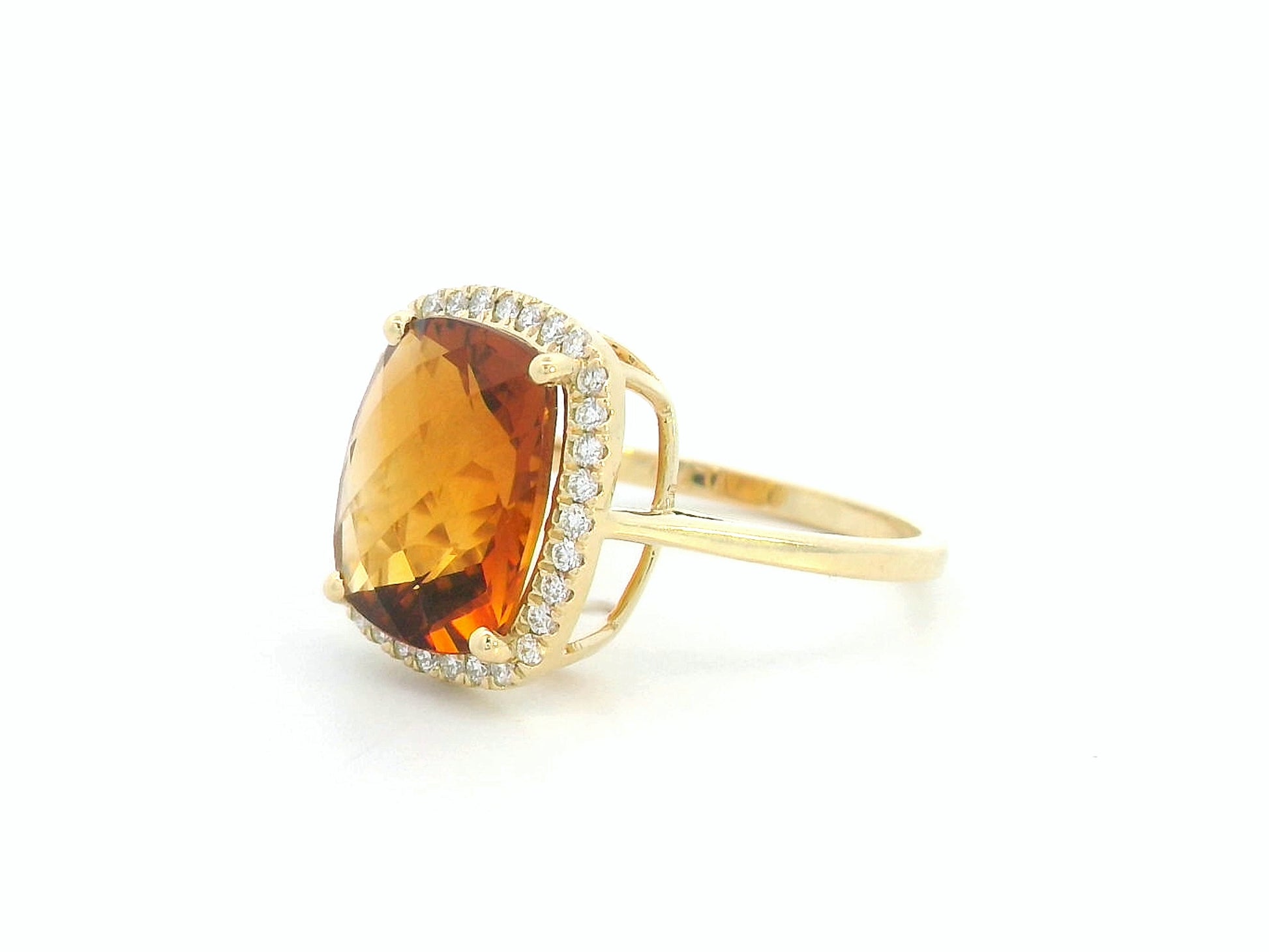 Yellow gold gemstone ring with cushion citrine center