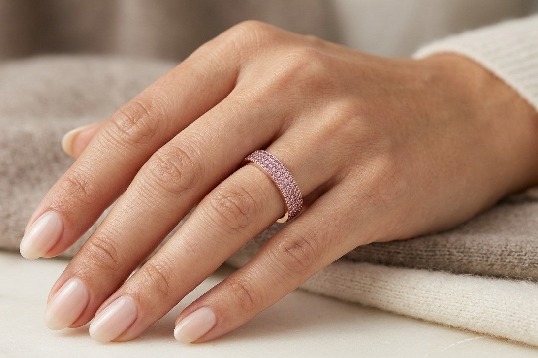 Pink sapphire band ring in 18K rose gold with multiple rows of round pink sapphires