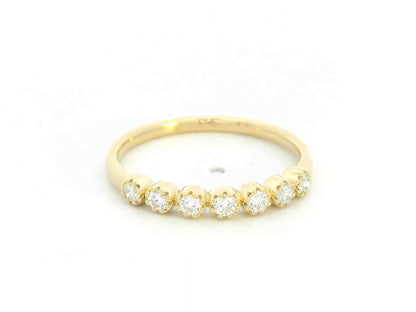 18K yellow gold half eternity ring with seven round diamonds

