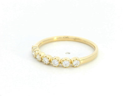 Diamond 7-stone ring with rounded prong settings