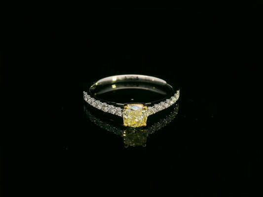 Cushion-cut fancy yellow diamond ring in 18K white gold