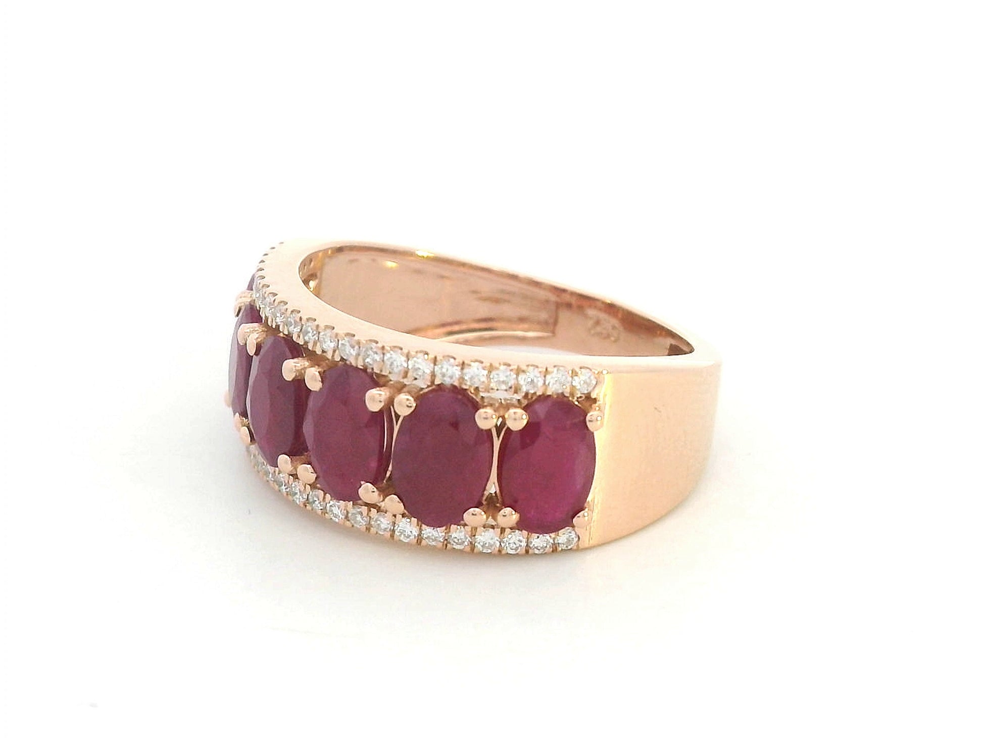 Luxury ruby center band ring with side diamonds in gold