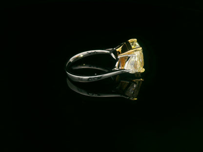 luxury engagement ring with 5.86ct cushion yellow diamond
