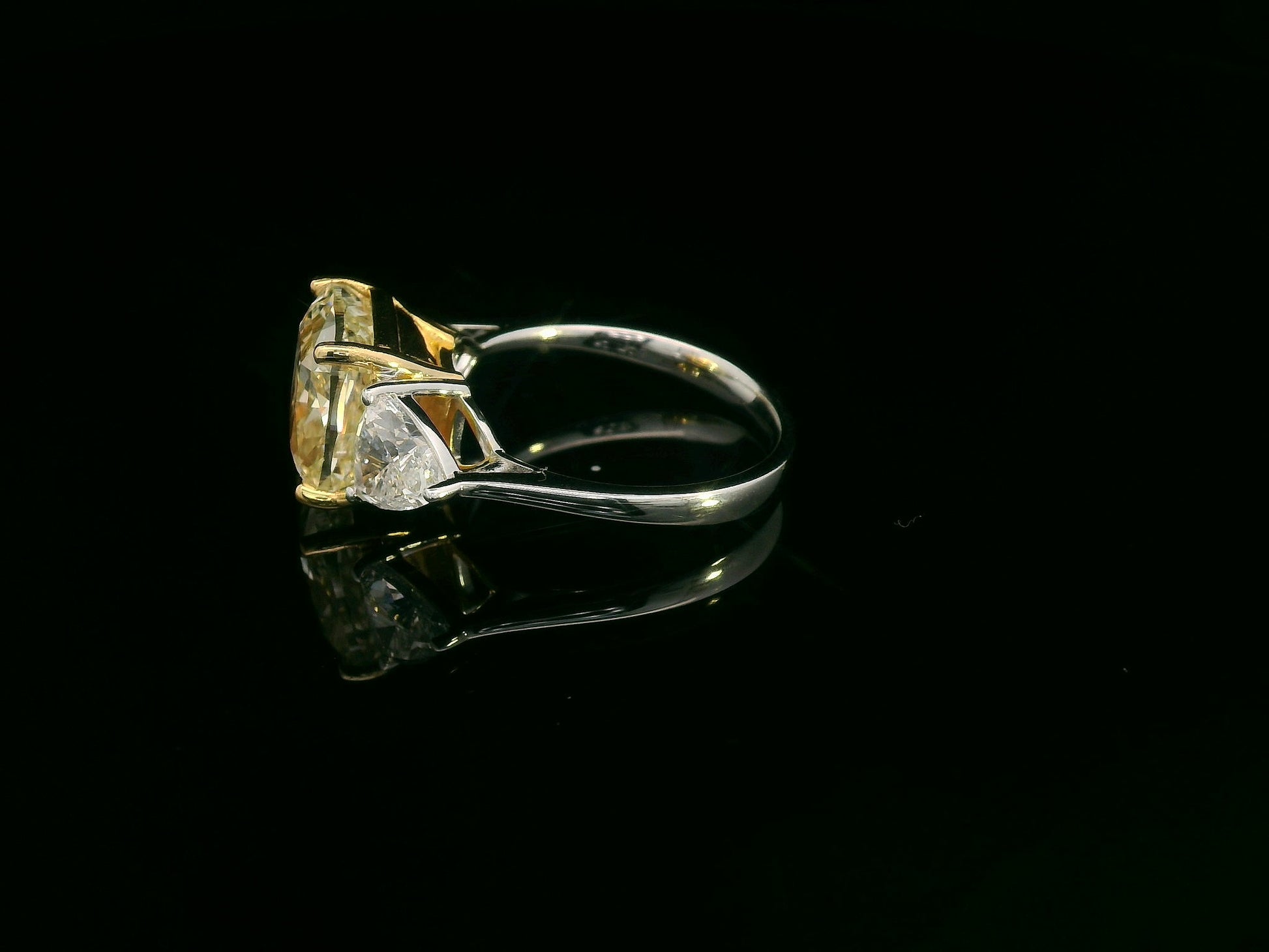 Trillion diamond side stones with Fancy Yellow diamond centerpiece

