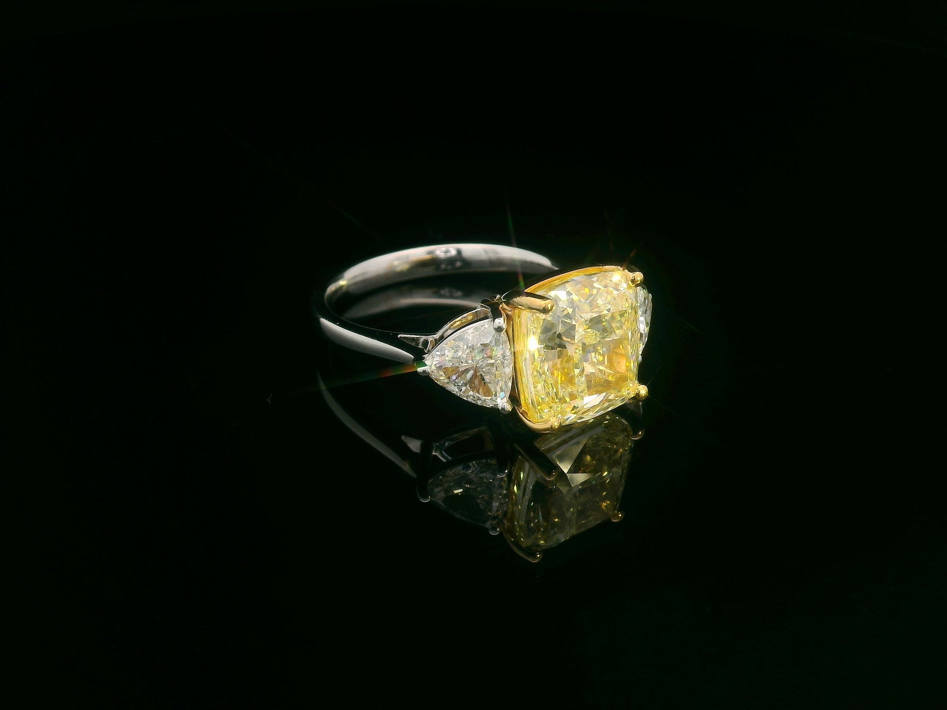 luxury engagement ring with 5.86ct cushion yellow diamond