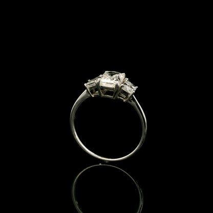 18K white gold radiant cut diamond engagement ring with a 1.51 carat HRD certified centre diamond and trapezoid side diamonds.