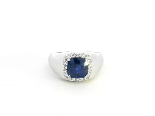 18K white gold men’s ring with 2.67ct cushion-cut blue sapphire and 0.30ct diamond halo.