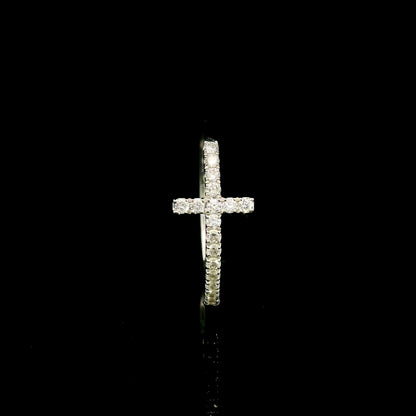 Diamond cross ring in 18K white gold featuring round brilliant diamonds set across the cross and along the slender band.