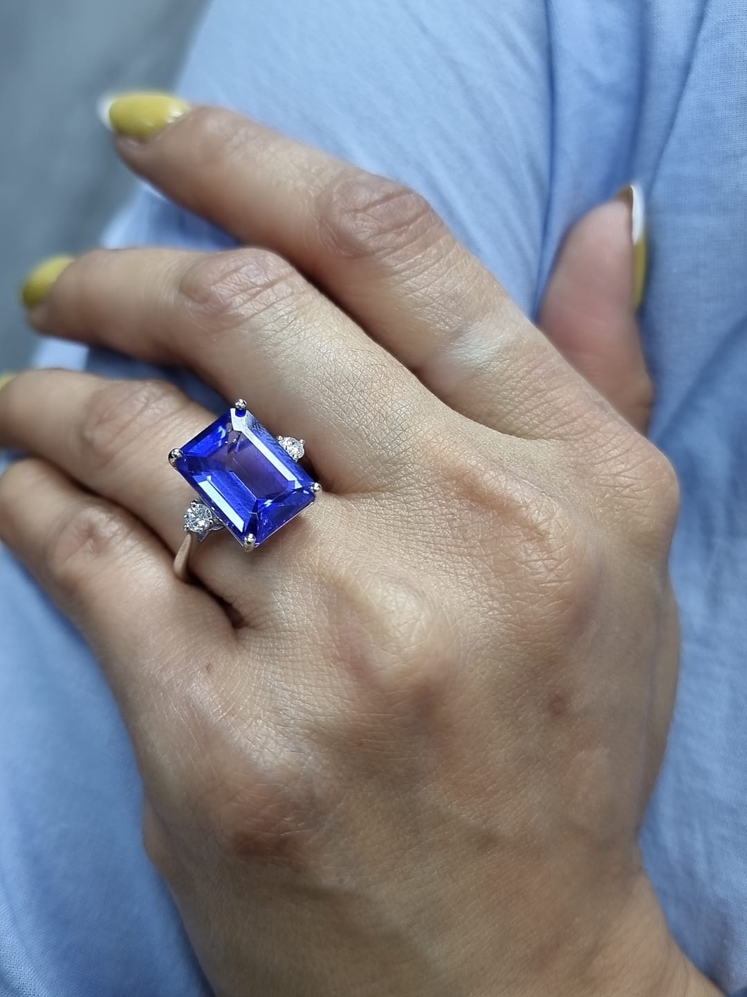 8.04 Carat Emerald-Cut Tanzanite Ring with Diamond Accents in 18K Gold