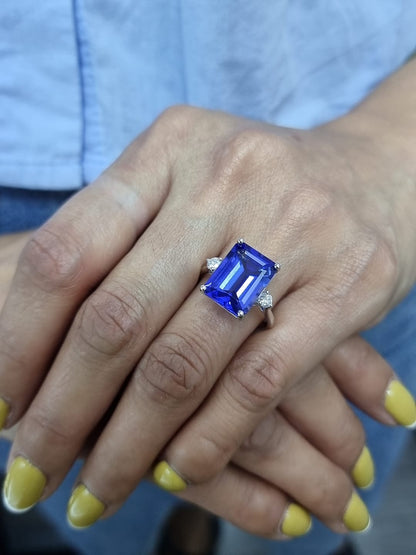 8.04 Carat Emerald-Cut Tanzanite Ring with Diamond Accents in 18K Gold