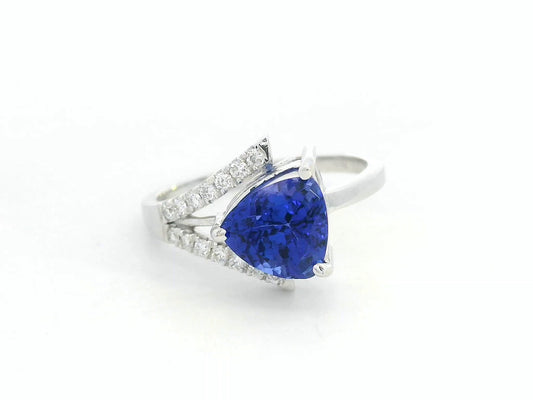 Front view of 18k white gold trillion-cut tanzanite and diamond split-shank ring