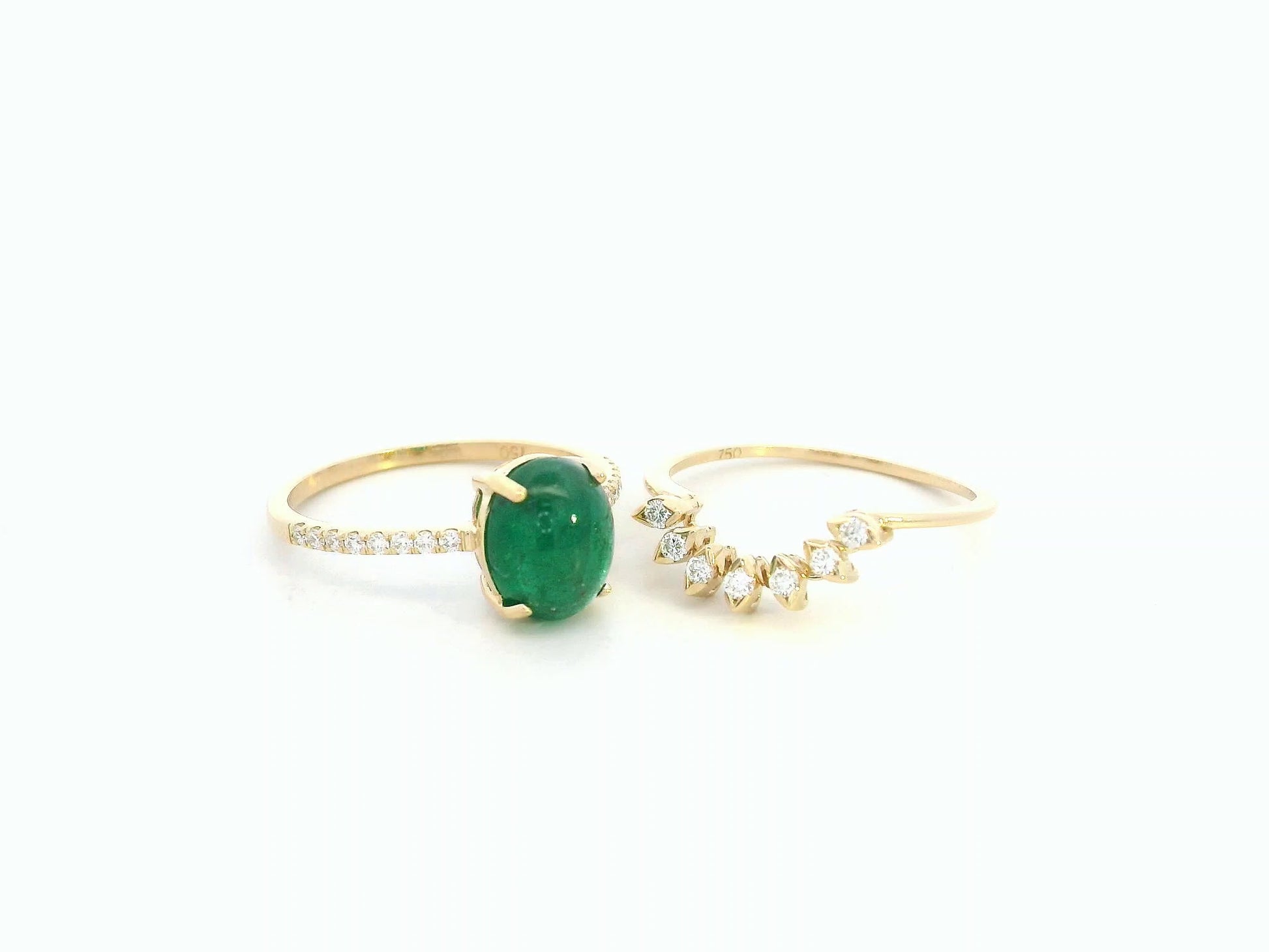 Side view highlighting emerald centerpiece and diamond detailing