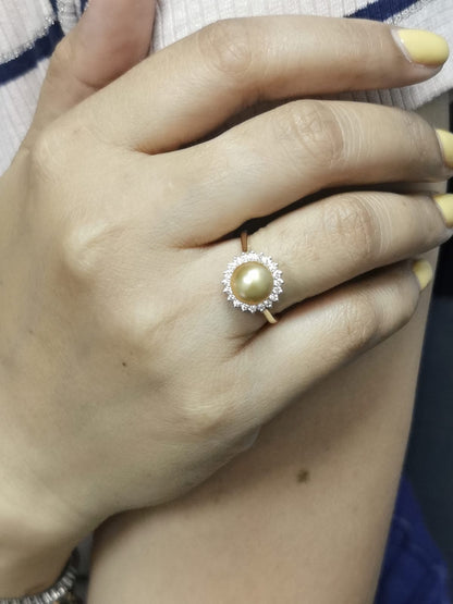Ring on finger showcasing opulent pearl and diamond combination