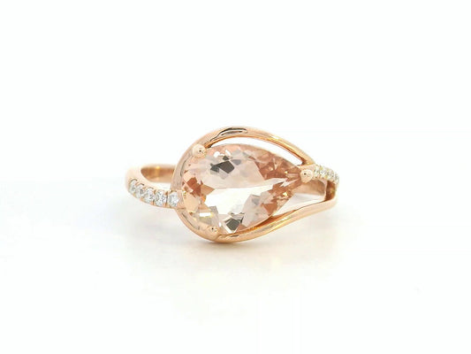 Front view of 18k rose gold ring with 1.79 ct pear-cut morganite and 0.09 ct diamonds