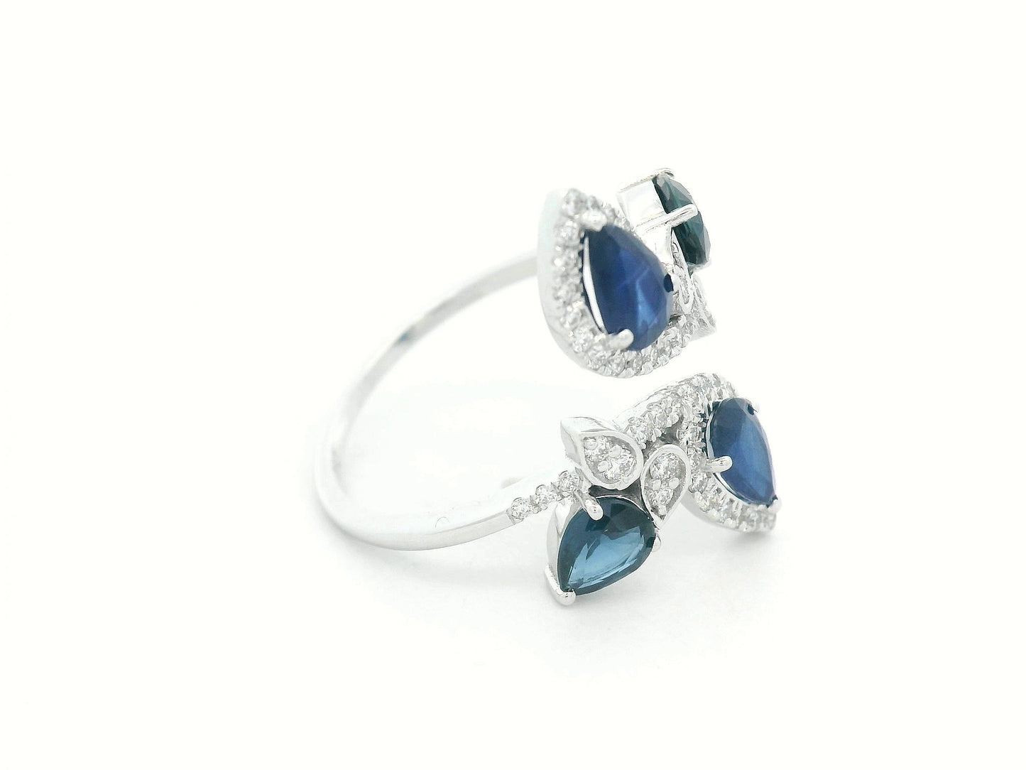 Side view showing fluid bypass design with gemstones along the curves