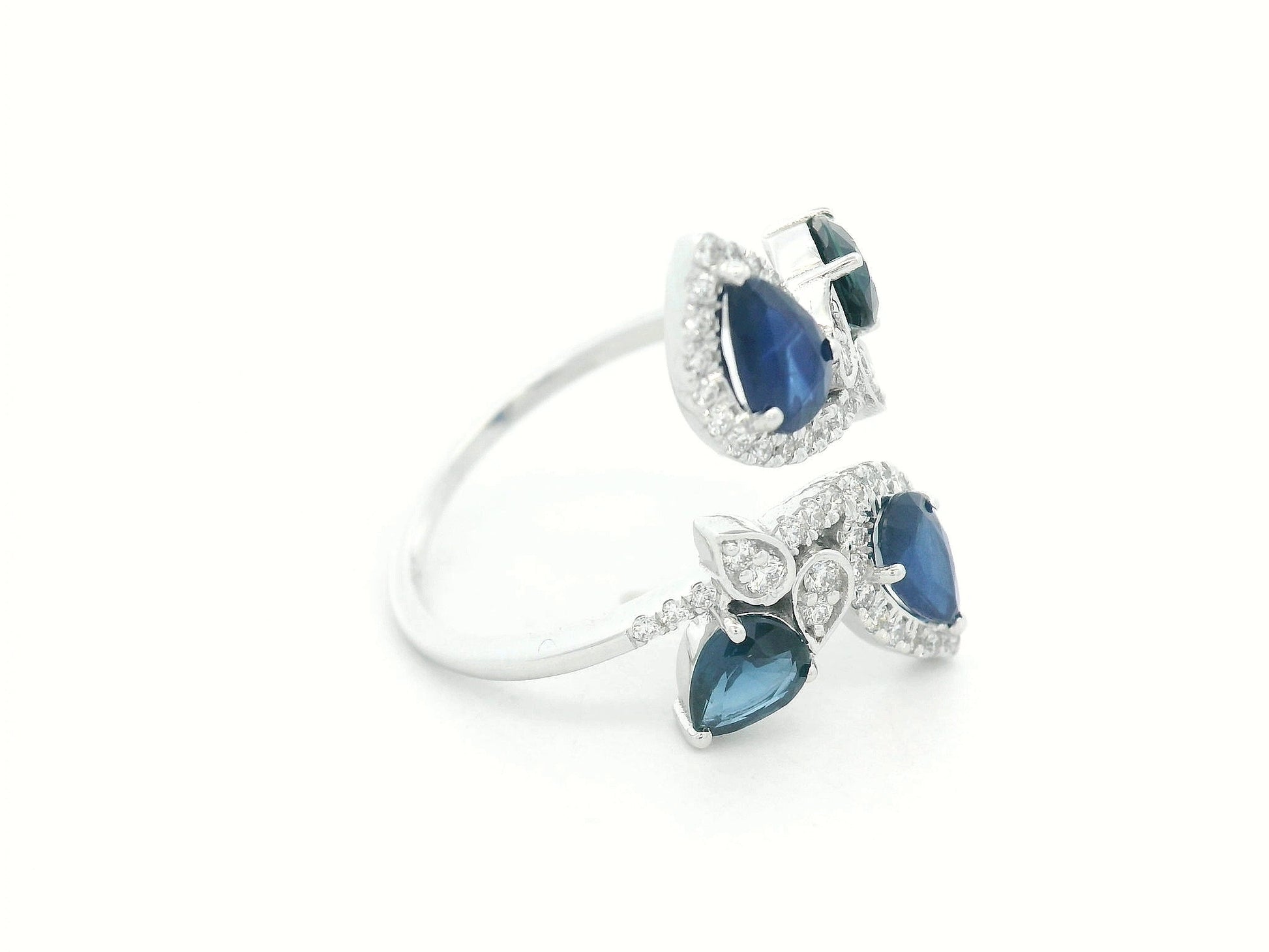 Side view showing fluid bypass design with gemstones along the curves