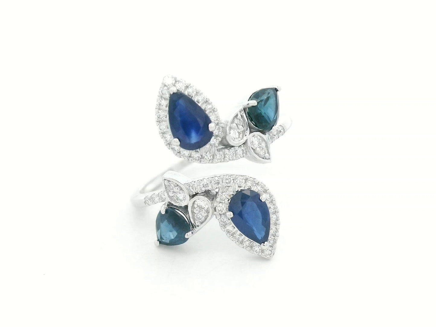 Front view of 18k white gold bypass ring with 1.55 ct blue sapphires and 0.27 ct diamonds