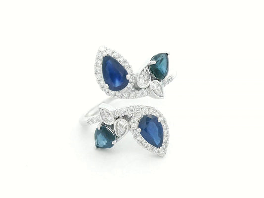 Front view of 18k white gold bypass ring with 1.55 ct blue sapphires and 0.27 ct diamonds