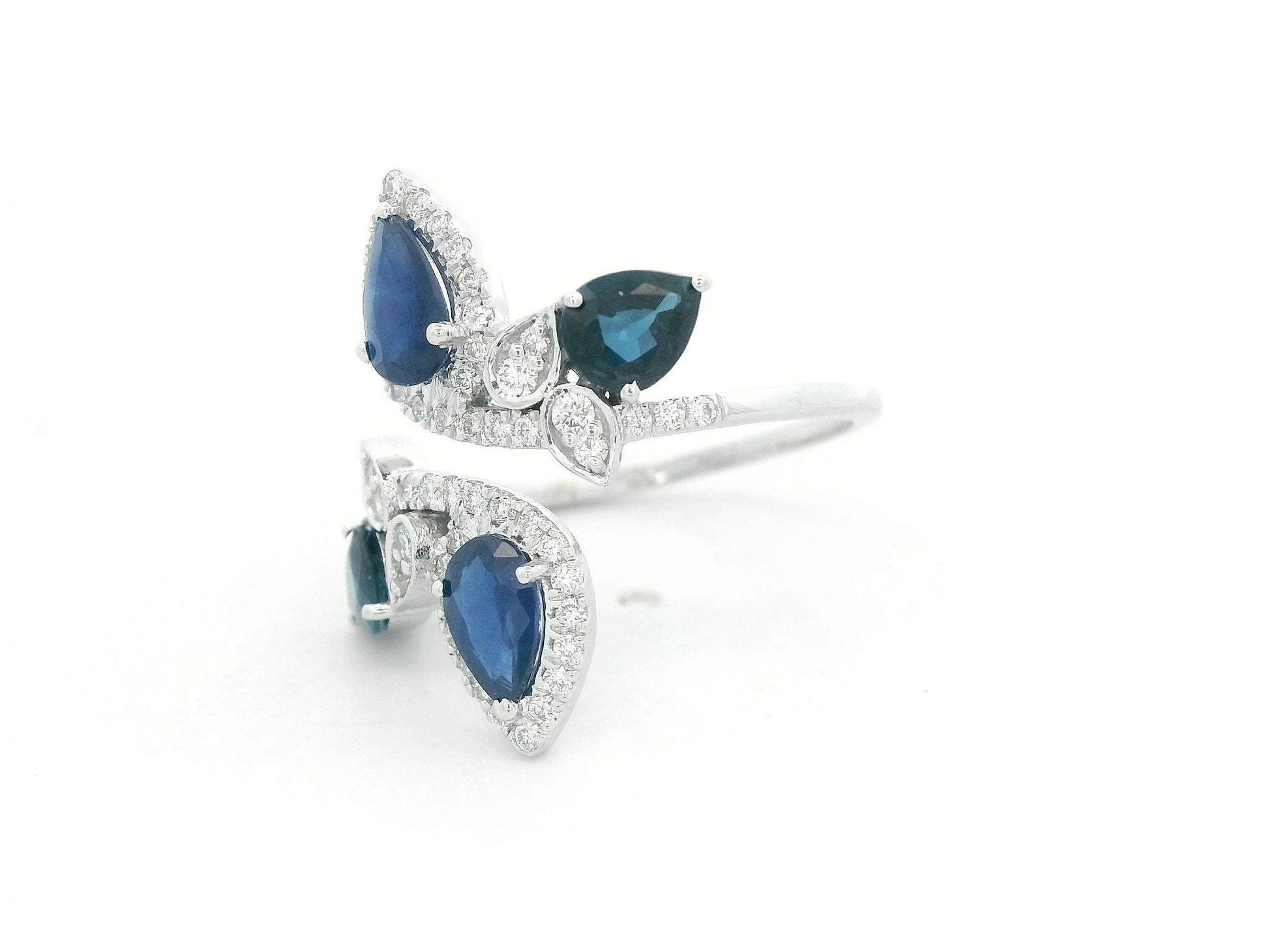 Side view showing fluid bypass design with gemstones along the curves