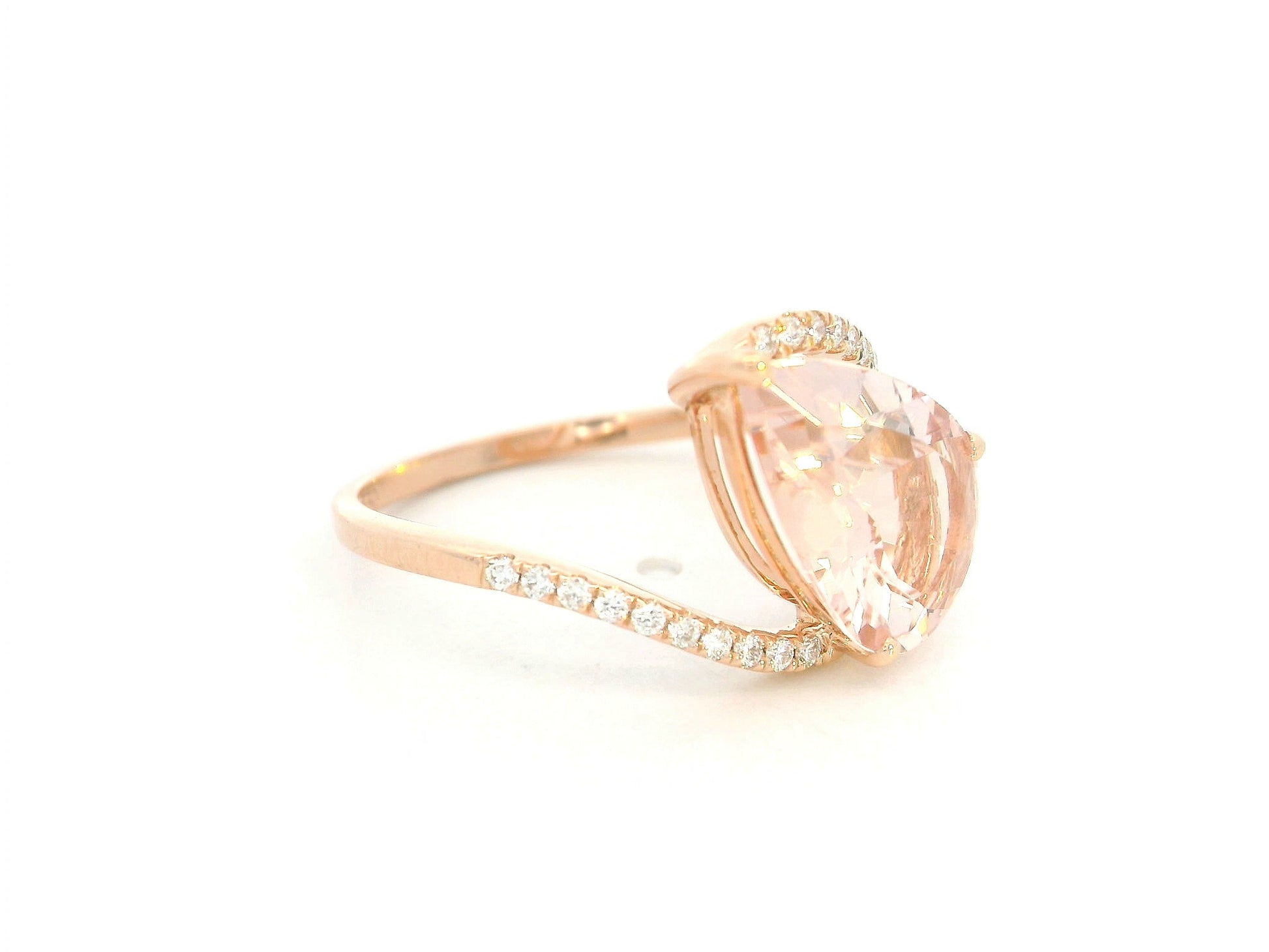 Side view showing twisting band and pavé-set diamonds
