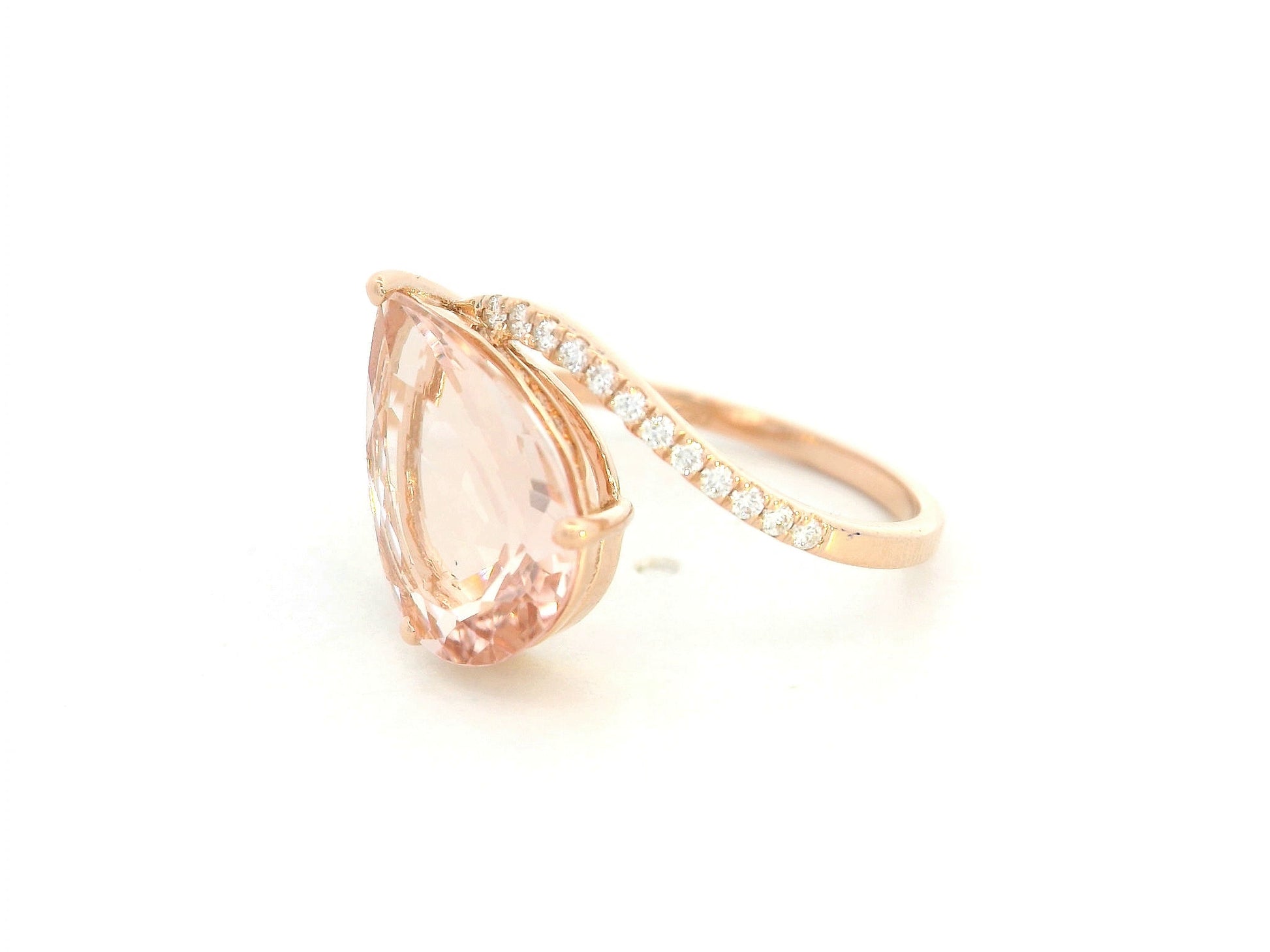 Side view showing twisting band and pavé-set diamonds