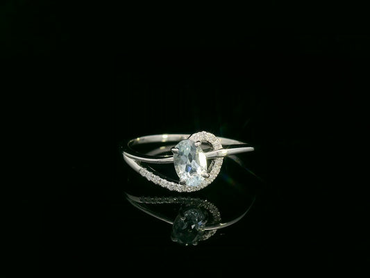18k white gold ring with 0.50ct oval aquamarine & 0.08ct diamond swirl – certificate included