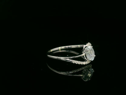 18k white gold ring with 0.50ct oval aquamarine & 0.08ct diamond swirl – certificate included