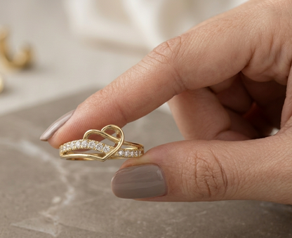 18K yellow gold open heart diamond ring featuring 0.21 carat natural round brilliant diamonds in a contemporary flowing design.