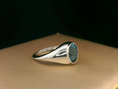 18k white gold ring with 2.13ct oval London Blue Topaz in modern bezel setting – certificate included