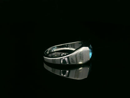 18k white gold ring with 1.26ct emerald-cut blue topaz in modern bezel setting – certificate included