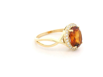 18k yellow gold ring with 1.78ct oval citrine & 0.11ct diamond halo – certificate included