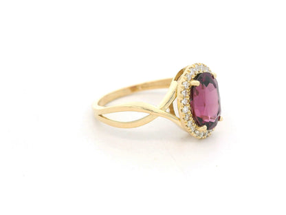 18k yellow gold ring with 1.99ct oval rhodolite & 0.14ct diamond halo – certificate included