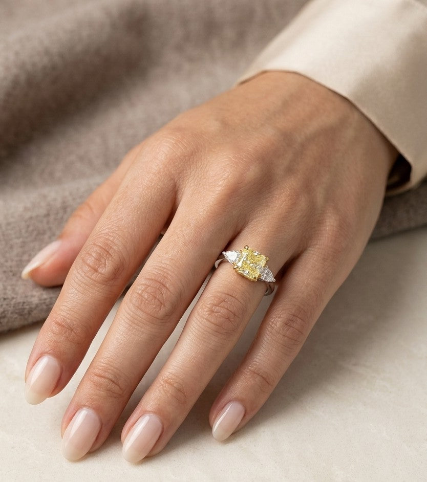 IGI Certified Fancy Yellow Cushion Diamond Three Stone Ring in 18K White Gold