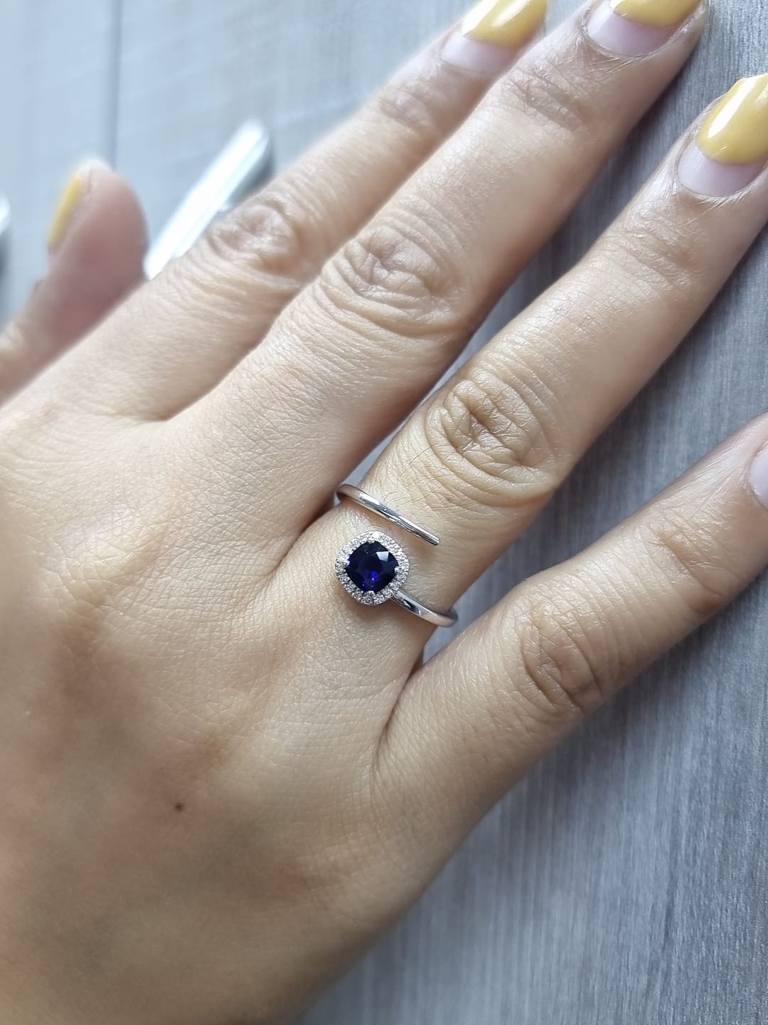 18K White Gold Blue Sapphire and Diamond Halo Bypass Ring – 0.59ct Sapphire