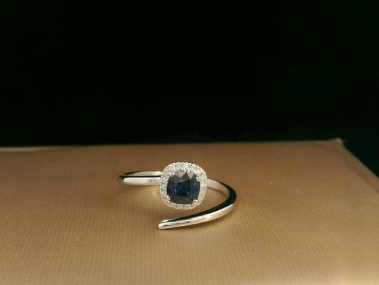 18K White Gold Blue Sapphire and Diamond Halo Bypass Ring – 0.59ct Sapphire