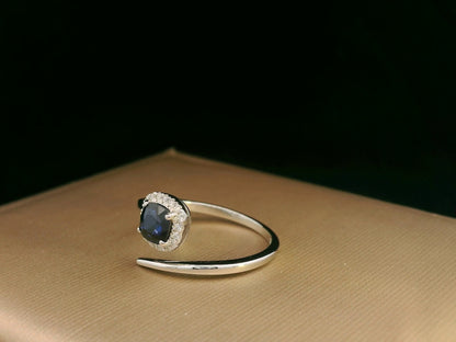 18K White Gold Blue Sapphire and Diamond Halo Bypass Ring – 0.59ct Sapphire