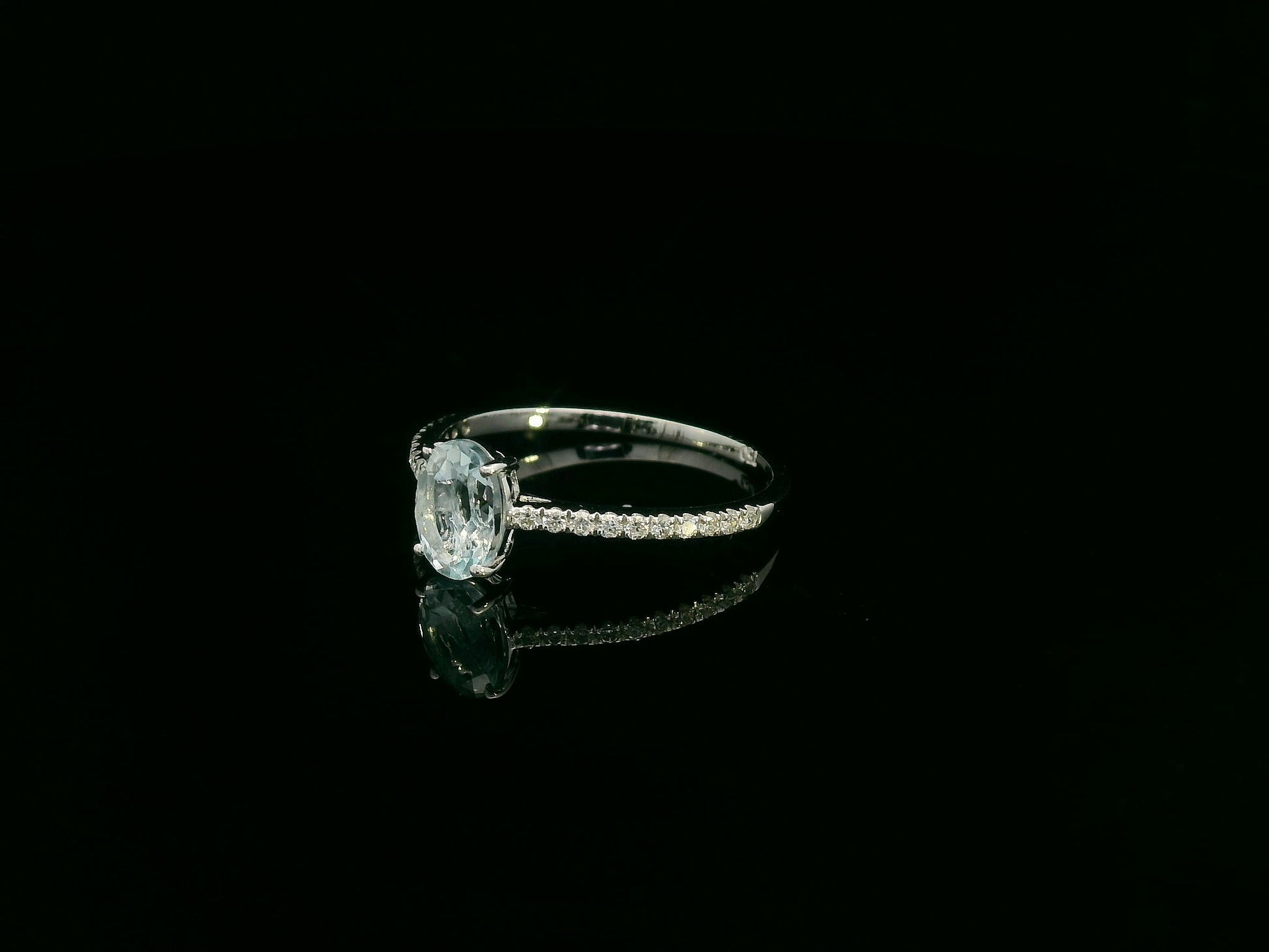 18K white gold oval aquamarine and diamond ring – elegant fine jewelry by Emirates Diamonds.