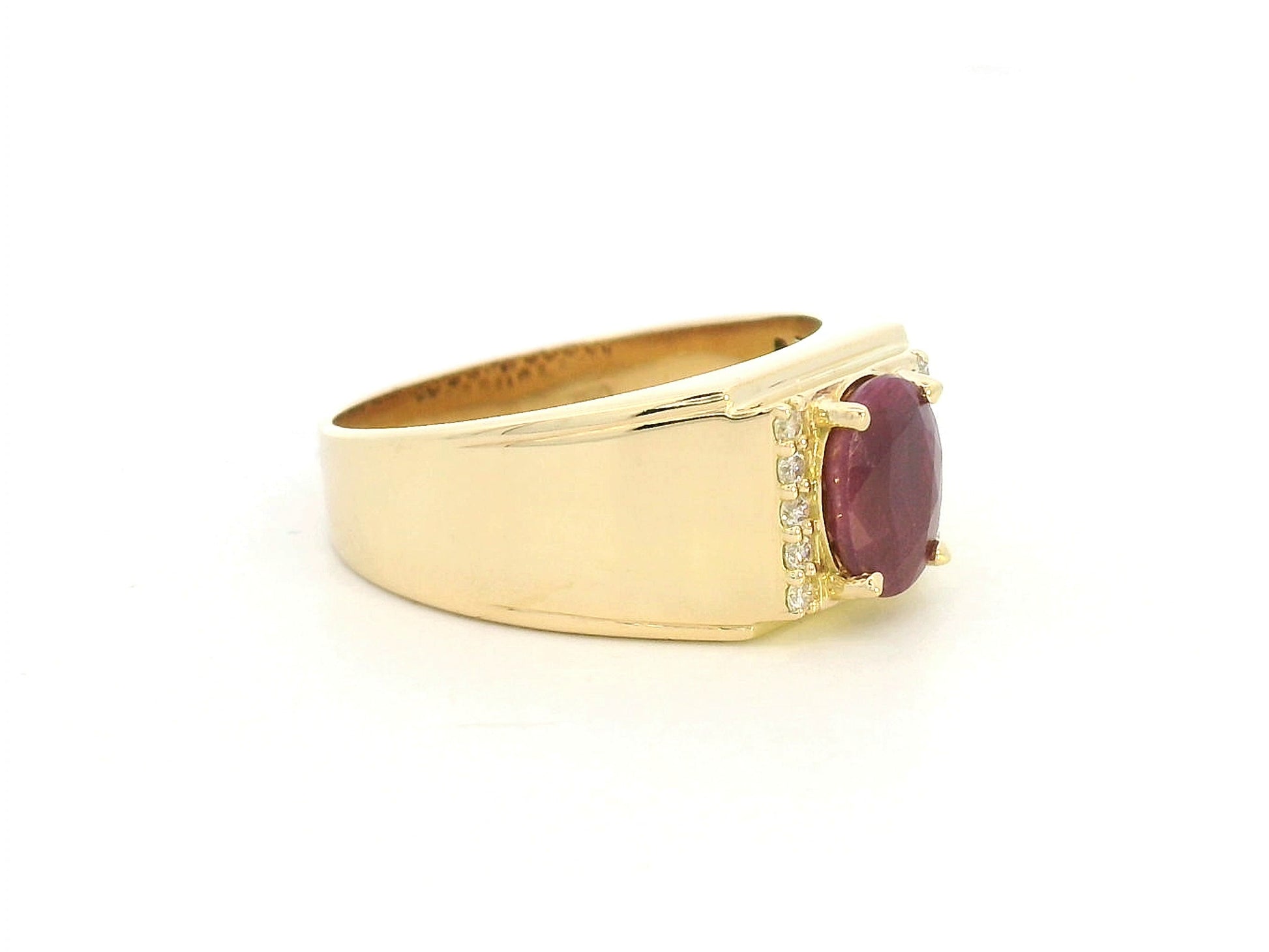 18K yellow gold men’s ruby ring with diamond accents – luxury statement jewelry by Emirates Diamonds