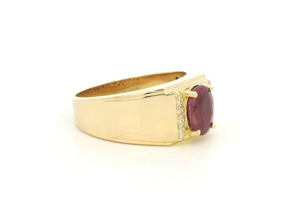 18K yellow gold men’s ruby ring with diamond accents – luxury statement jewelry by Emirates Diamonds