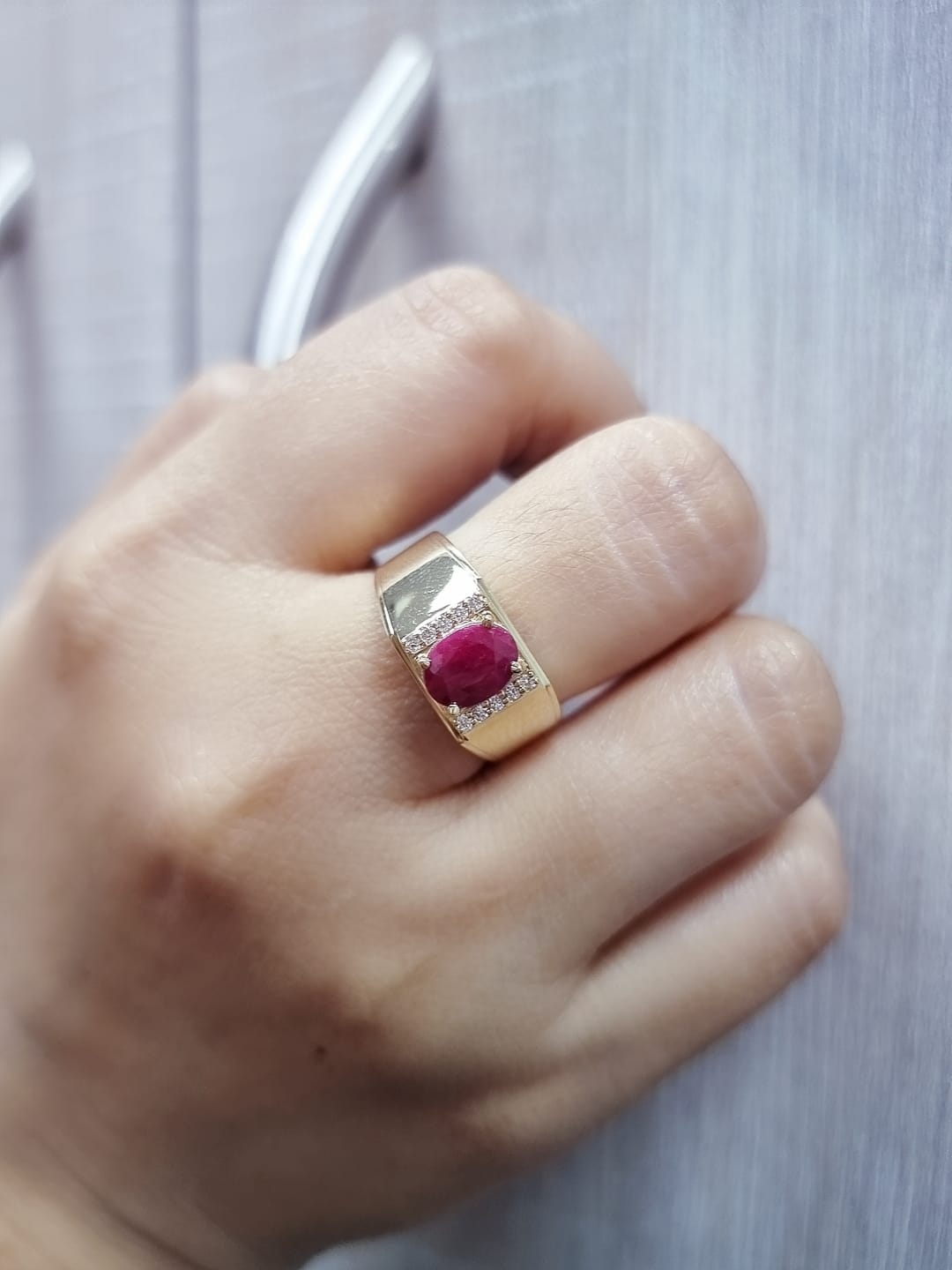 18K yellow gold men’s ruby ring with diamond accents – luxury statement jewelry by Emirates Diamonds