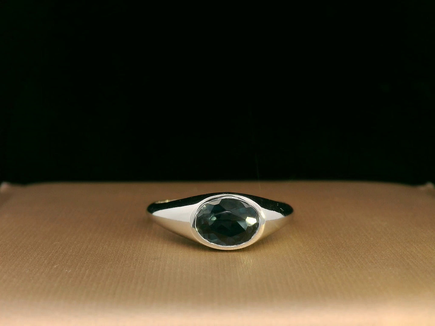 Unisex 18K gold London Blue Topaz bezel ring with minimalist tapered band