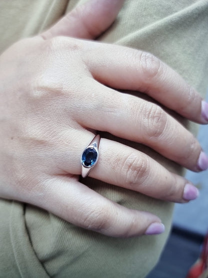 Unisex 18K gold London Blue Topaz bezel ring with minimalist tapered band