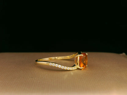 18K gold ring with 0.91 carat cushion-cut citrine and 0.11 carat diamond ribbon, modern luxury design