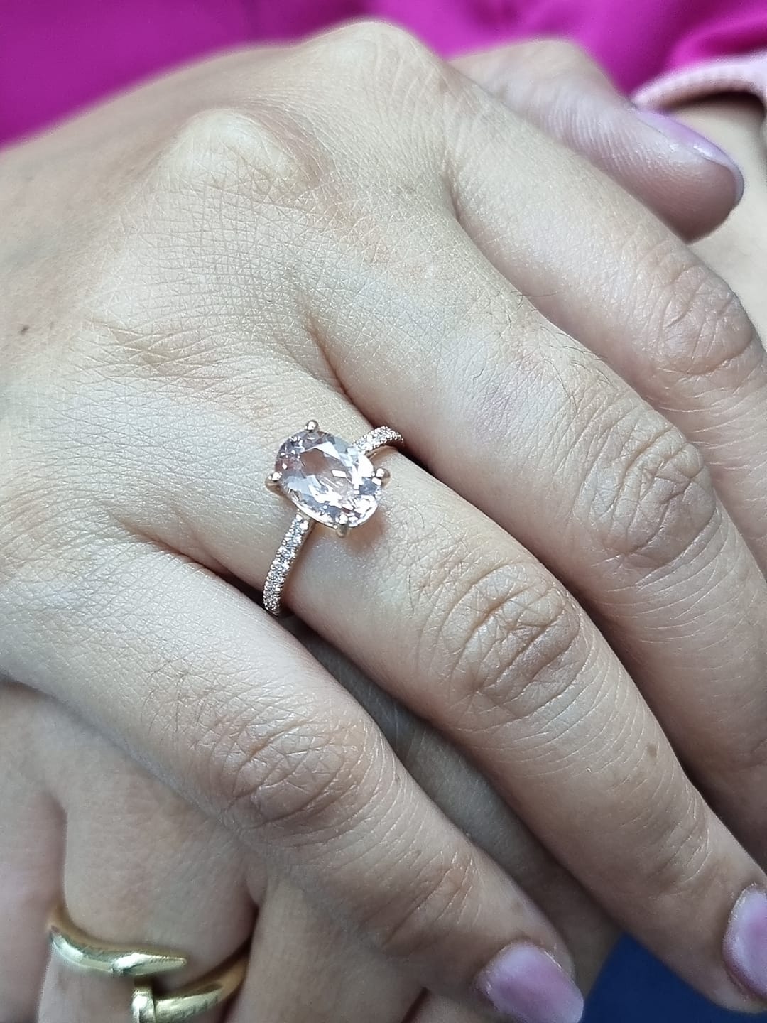 18K rose gold ring with 2.13 carat oval morganite and 0.21 carat diamond accents, elegant contemporary design