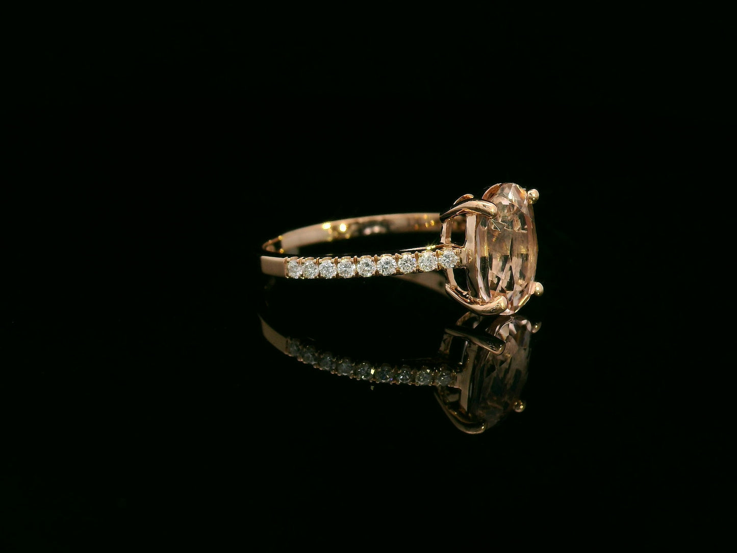 18K rose gold ring with 2.13 carat oval morganite and 0.21 carat diamond accents, elegant contemporary design
