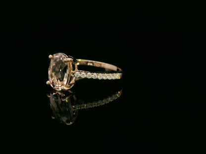 18K rose gold ring with 2.13 carat oval morganite and 0.21 carat diamond accents, elegant contemporary design