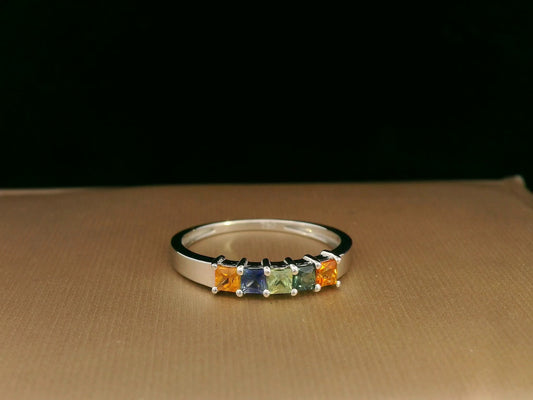 Multi-colored princess-cut sapphire ring in 18K white gold