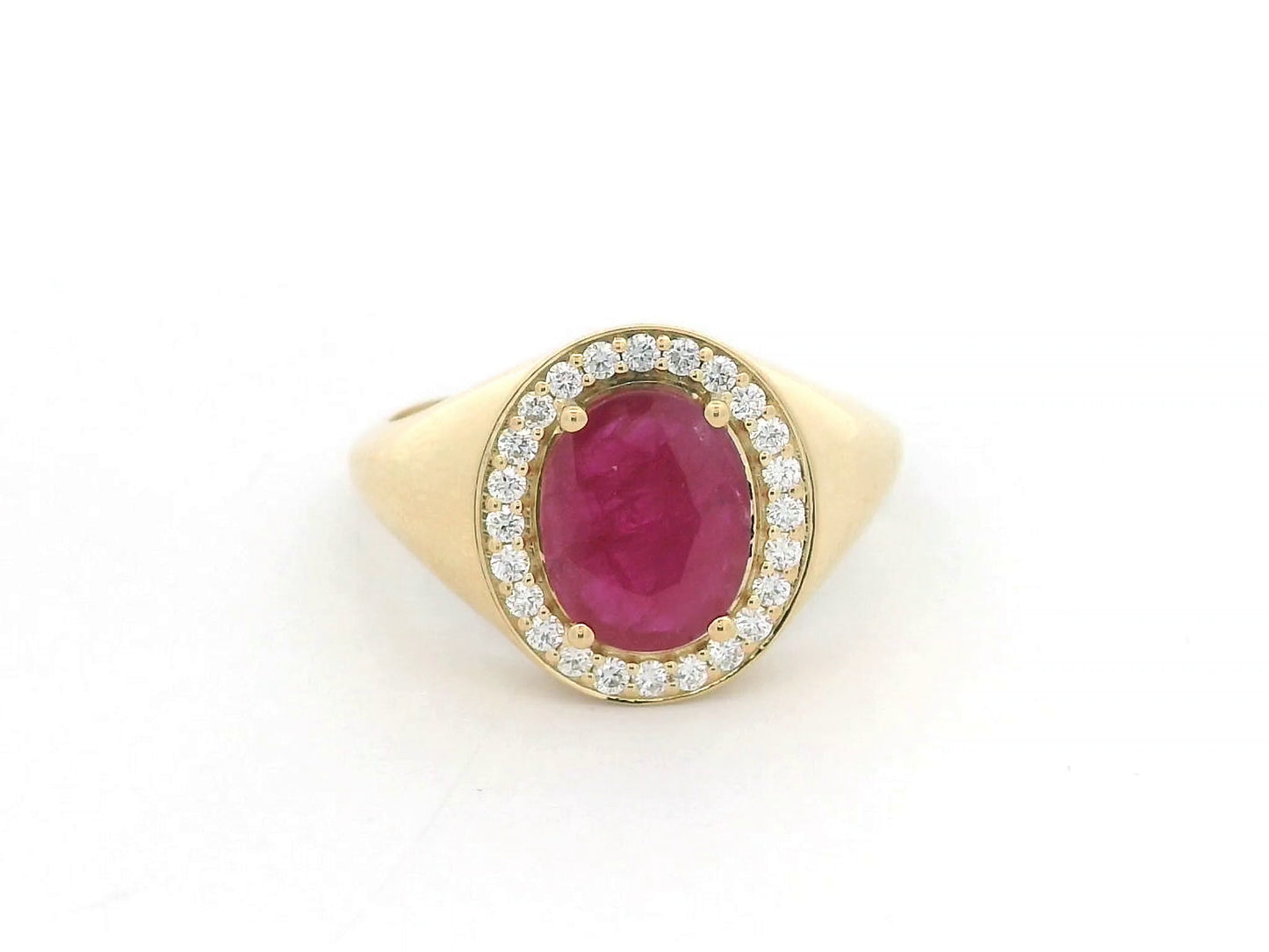 Men’s 18K yellow gold ring featuring 2.58 ct oval ruby with diamond halo and tapered band